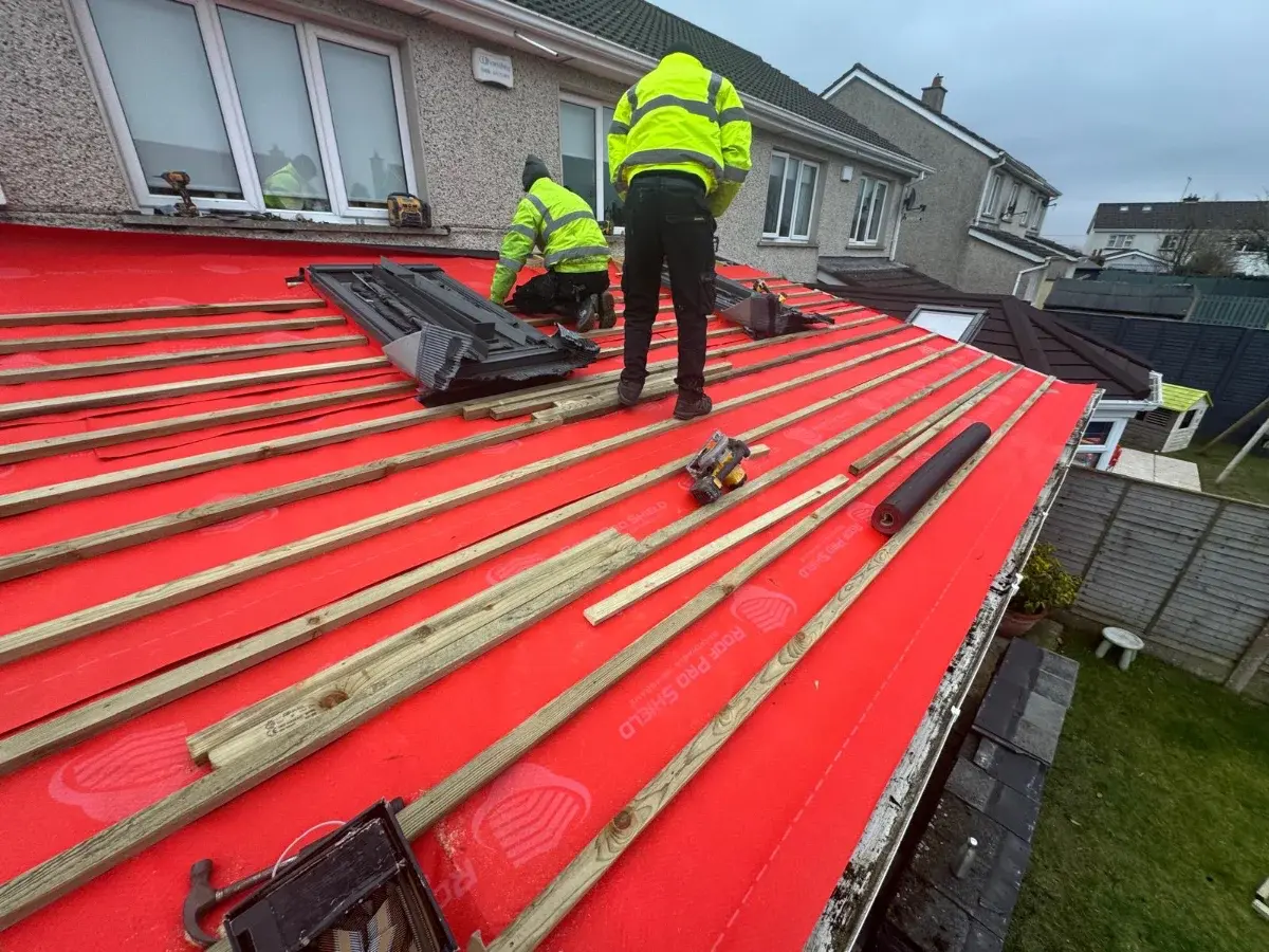 Roof Pro Shield C150 breathable membrane being installed on slate roof South Dublin Roof Pro Ltd